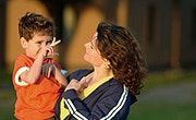 Woman and child talking with sign language