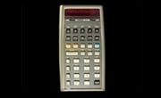 Click to go to larger photo of the Hewlett-Packard-65 programmable pocket calculator.