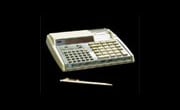 Click to go to larger photo of the Hewlett-Packard-97 programmable printing calculator.