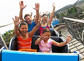Sharpened photo of family on roller coaster.