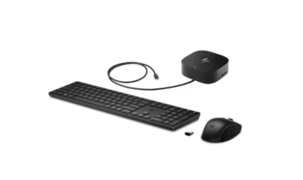 Paket aksesori komputer HP yang dilengkapi keyboard, mouse, dan hub untuk penyiapan laptop yang lancar.