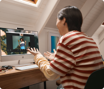 Woman having video call on HP Pavilion All-in-One Desktop