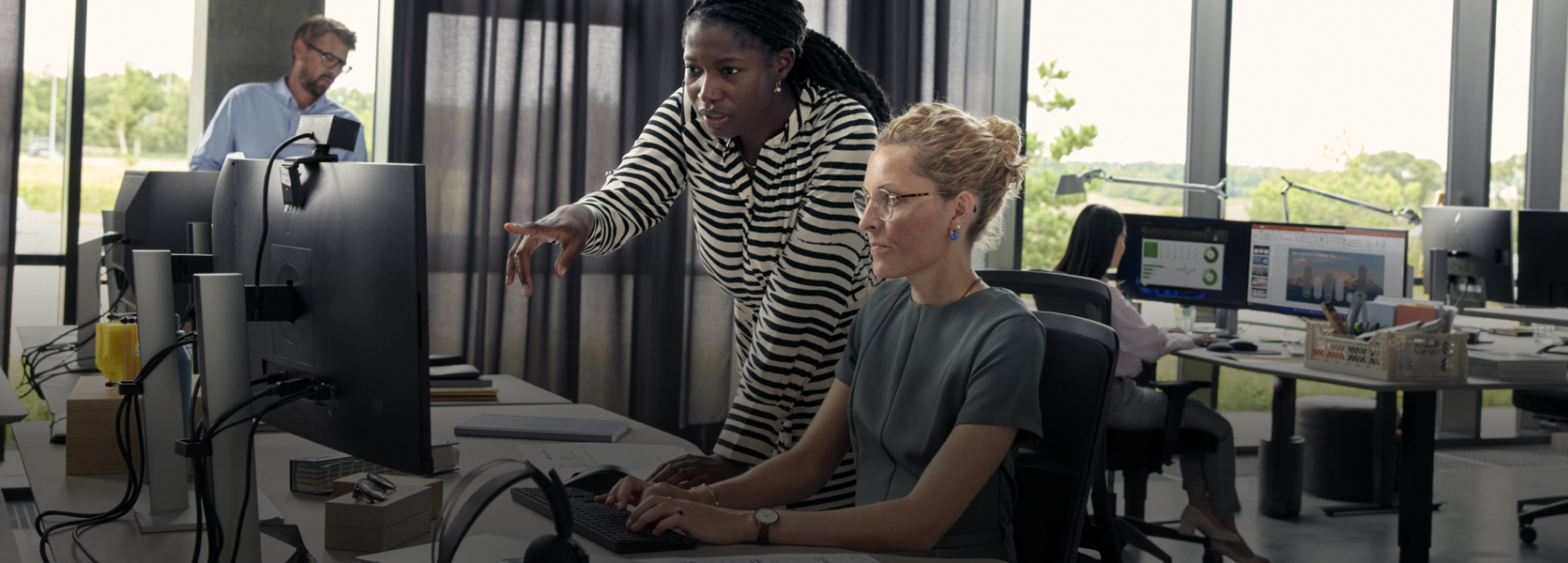 Coworkers working together in an office.