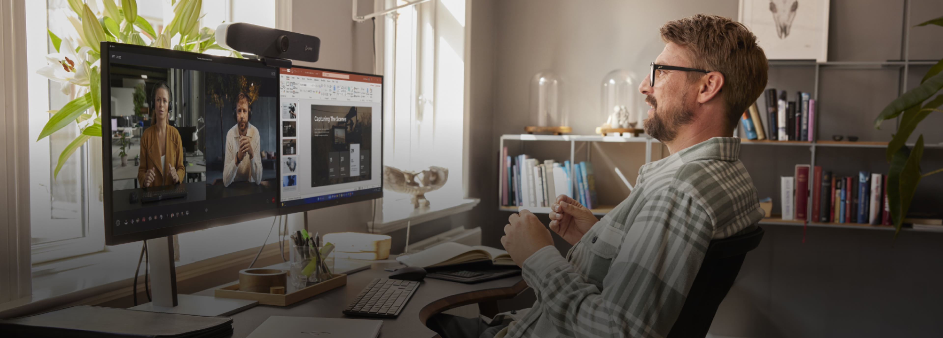 Man working on an HP laptop from home.