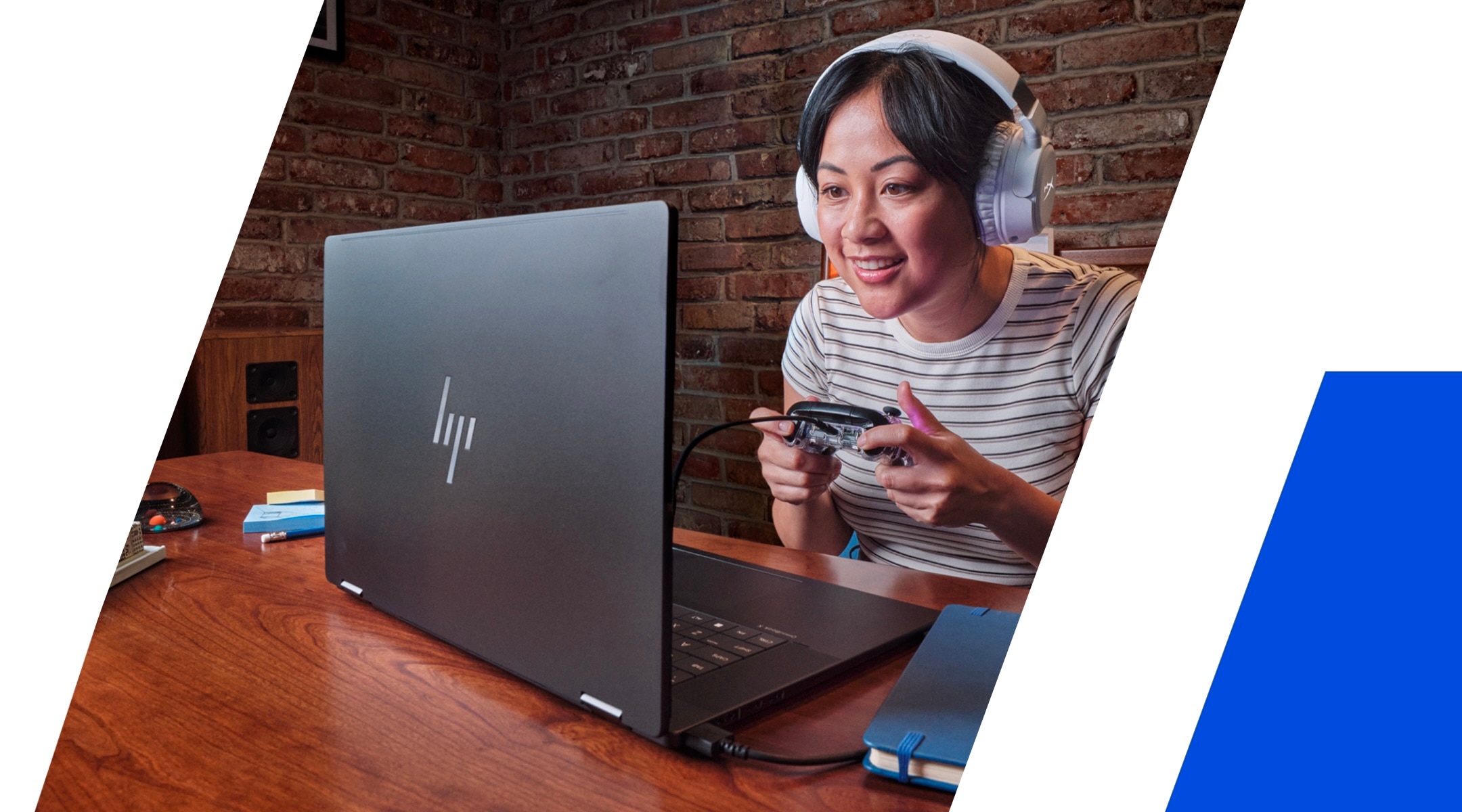 A woman playing on her HP laptop