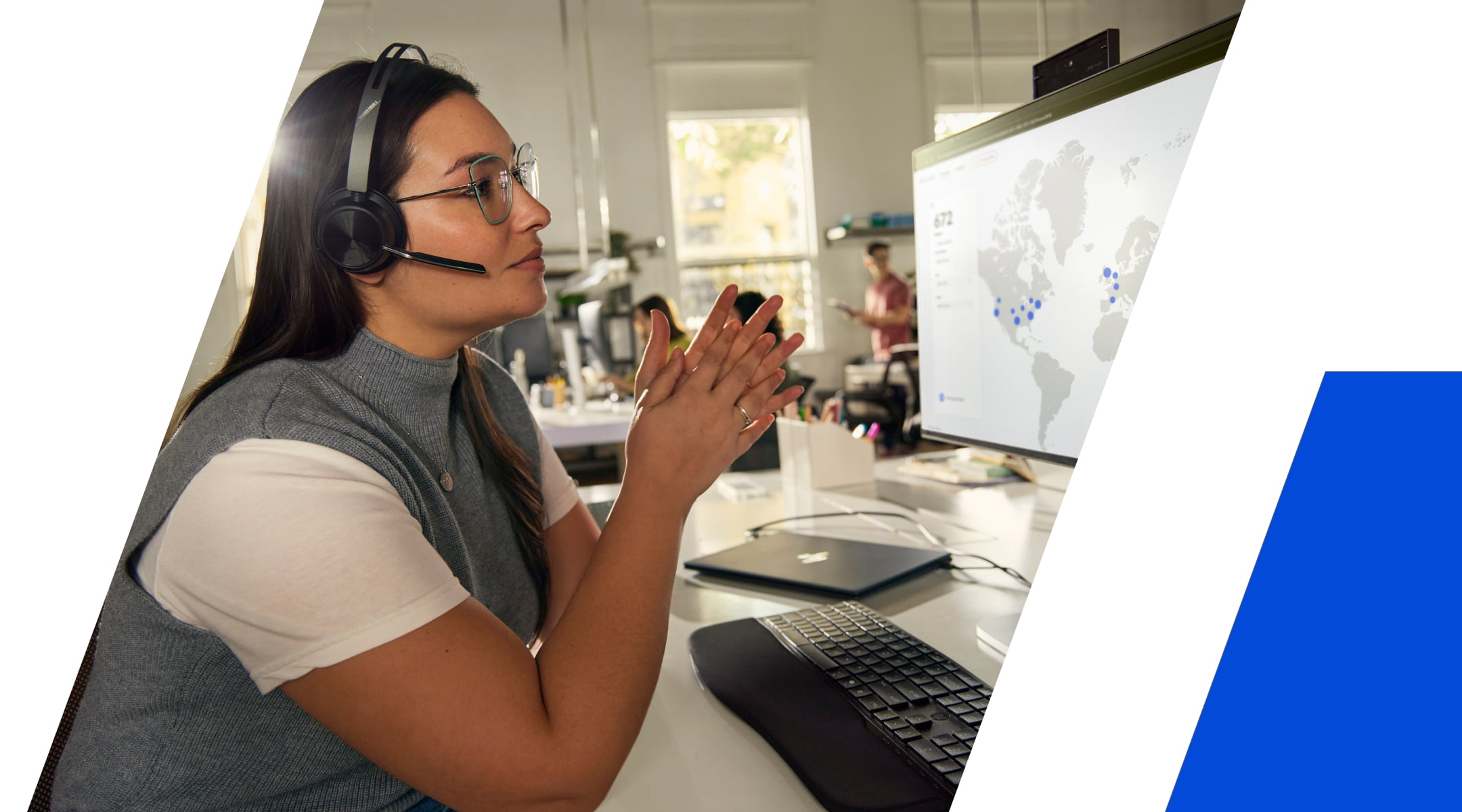 Woman wearing a headset and working