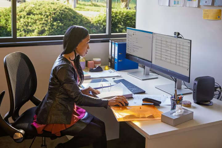 Image of woman working in office