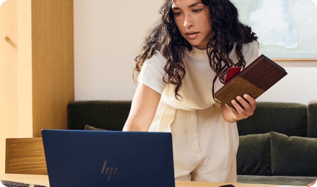Professional using HP business laptop