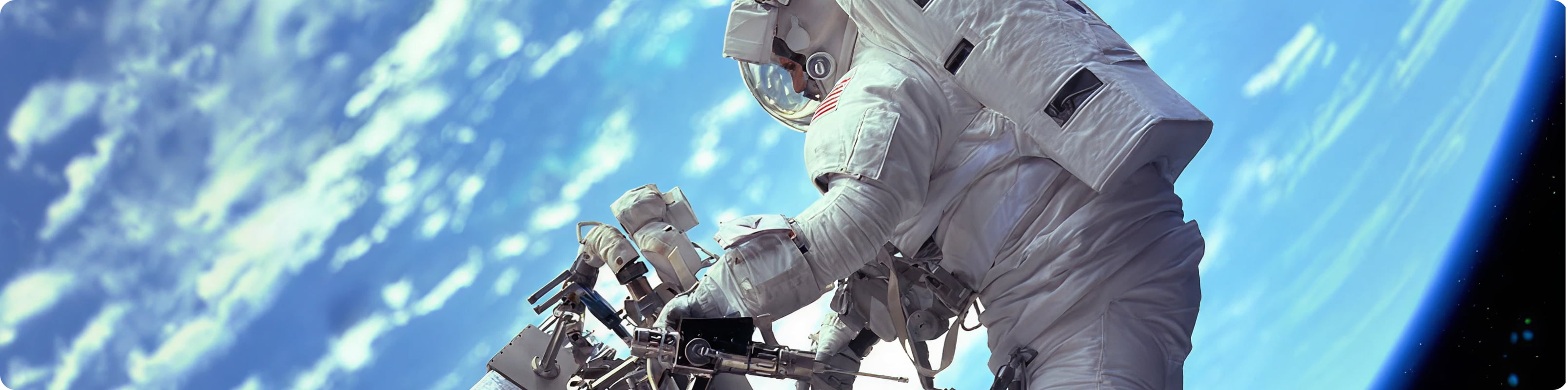Astronaut working on the outside of the international space station, Earth is in the background
