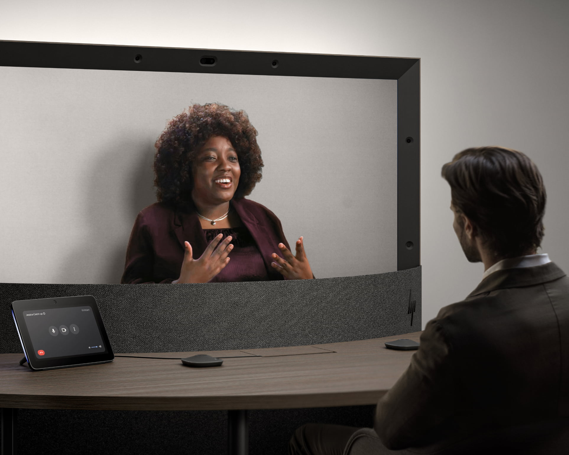 Man with a woman on a screen