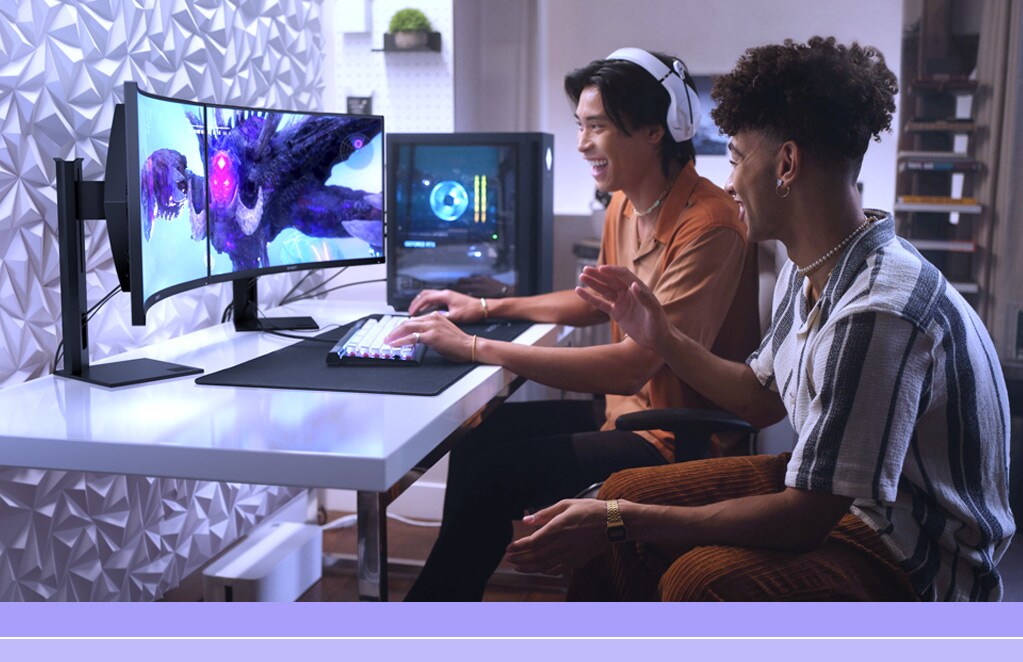 Gamers enjoying dual monitor setup