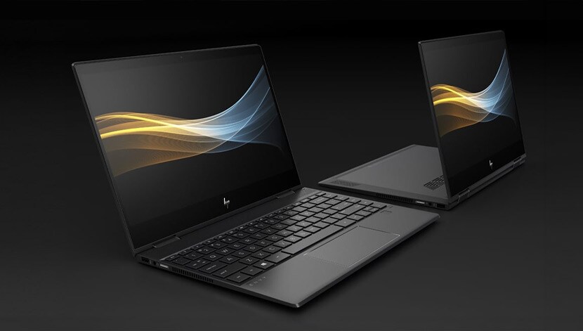 image of envey laptops sitting on a black surface