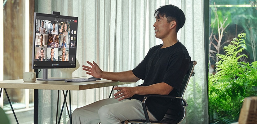 man is working with an AIO