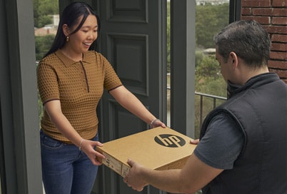 image of a delivery guy handing an HP package to a woman