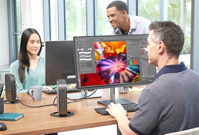 people in an office working with Thin Clients and Chrome based PCs