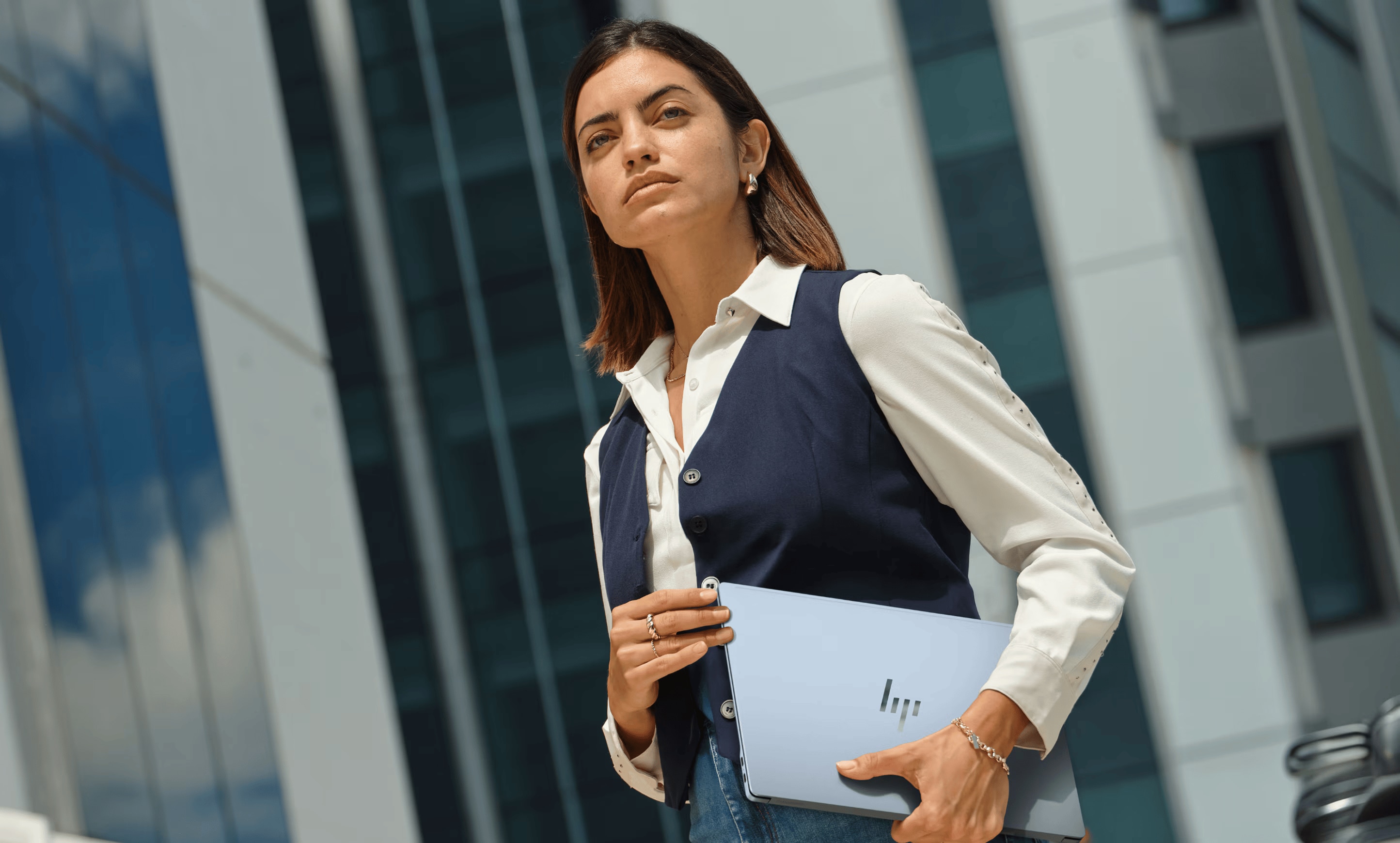 Women Holding OmniBook Ultra laptop