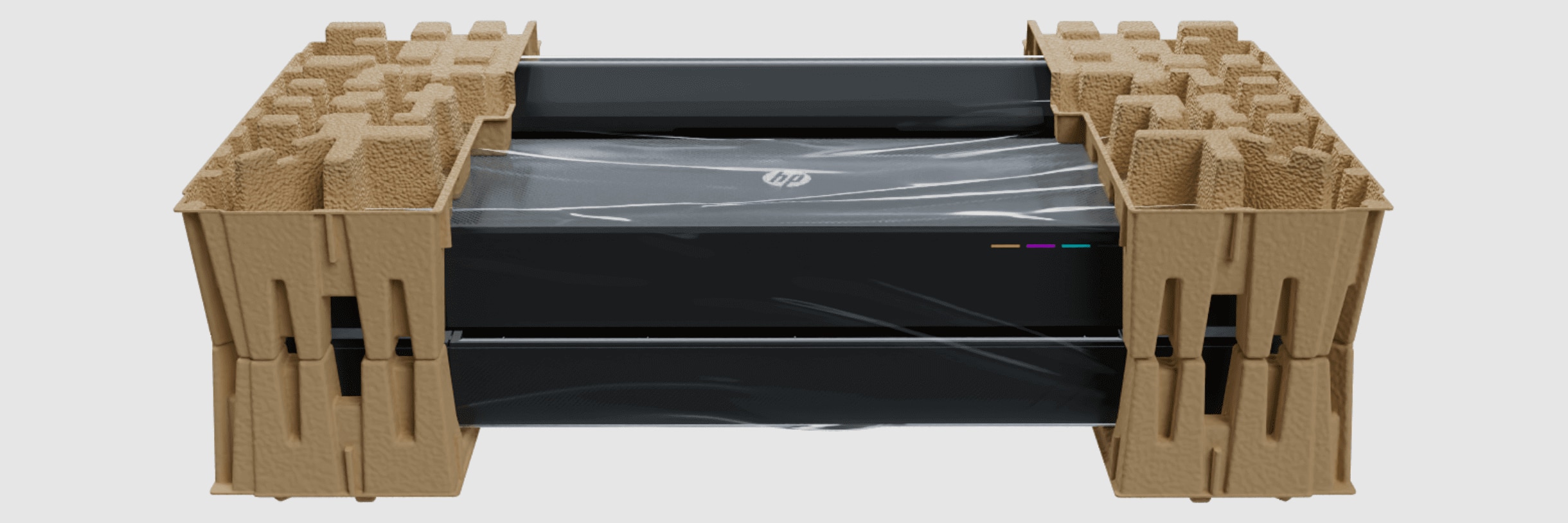 Front view of the HP DesignJet T650 plotter with packaging and printed media