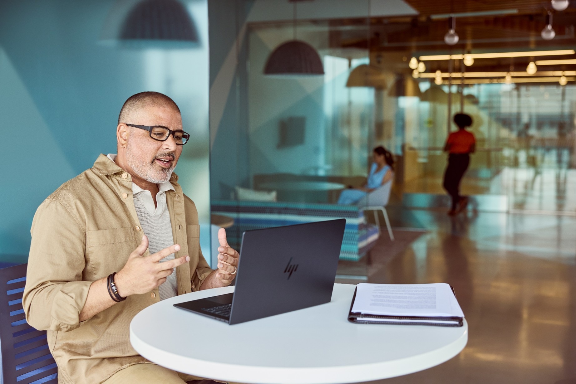 Man using HP computer in hybrid office